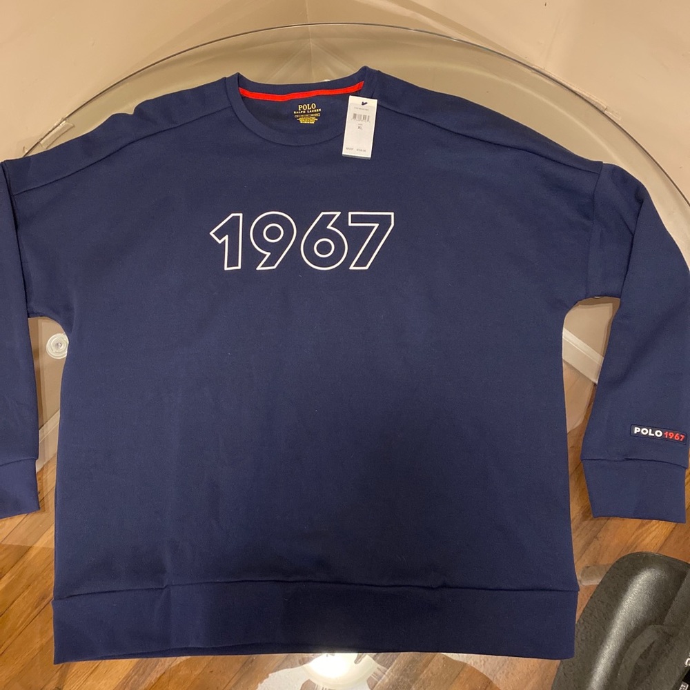 polo long sleeve sweater . XL Msrp 168$